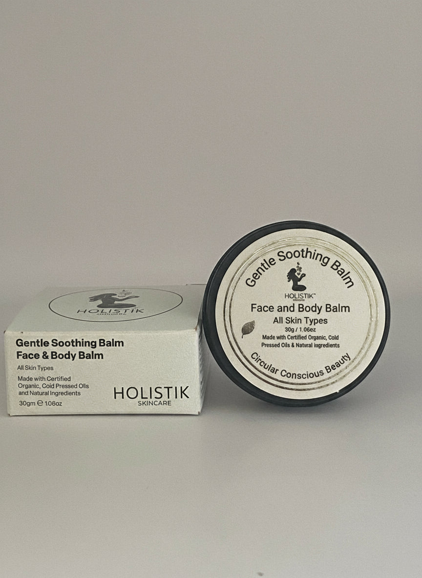 Holistik Gentle Soothing Balm container and packaging on a gray background