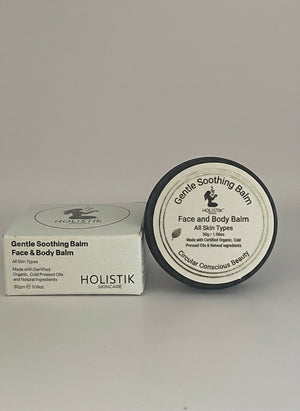 Holistik Gentle Soothing Balm container and packaging on a gray background