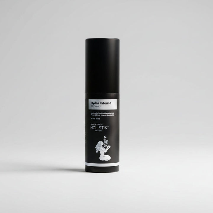 Black bottle of Holistik Skincare Hydra Intense 4D Serum on white background