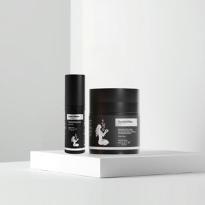 Two black cylindrical containers with labels on a white background