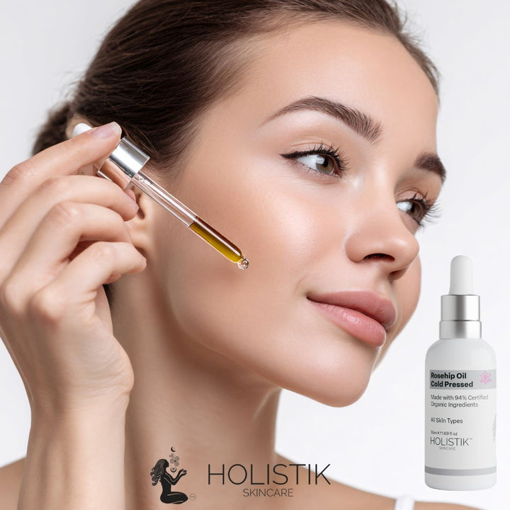 Rosehip Infused Face Oil for deep hydration, brightening, and skin repair. Fades pigmentation and fine lines for a glowing, even complexion. Best face oil for dry skin - Holistik Skincare