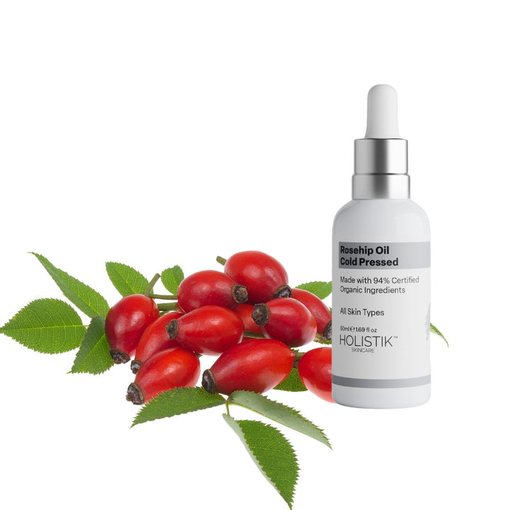 Rosehip Infused Face Oil for deep hydration, brightening, and skin repair. Fades pigmentation and fine lines for a glowing, even complexion. Best face oil for dry skin - Holistik Skincare