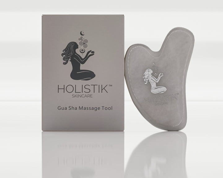 Lift, firm, and sculpt your skin with the Holistik Skincare White Jade Gua Sha Tool. Reduce puffiness, improve skin elasticity, and boost collagen naturally - Holistik Skincare